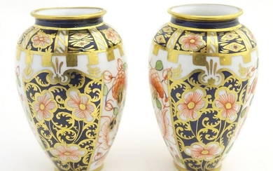 Two small Crown Derby Imari vases, with floral