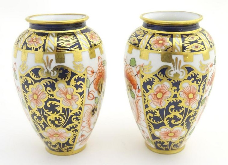 Two small Crown Derby Imari vases, with floral