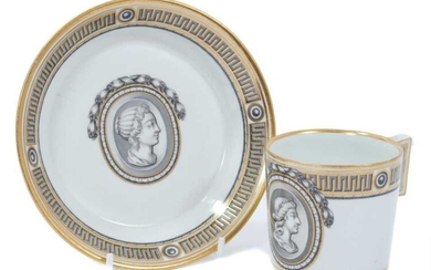 Vienna coffee can and saucer, circa 1780, painted en grisaille with a portrait in profile, the edge with fret pattern, highlighted in gilt, underglaze blue marks to bases, the saucer measuring 13.5...