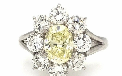 1.10 ct. Fancy Light Yellow Oval Brilliant Halo Diamond