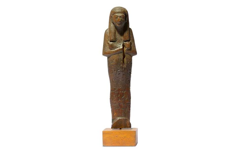 AN EGYPTIAN WOOD SHABTI FOR SETI I New Kingdom,...