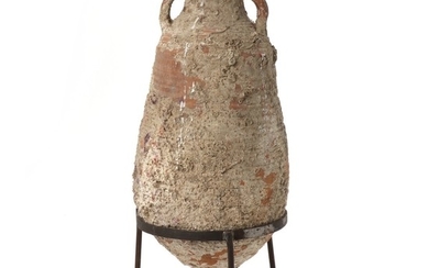 Amphora with sea sediments. Late Roman- Byzantian, 5th-7th century AD. On stand. H. excl. stand c. 50 cm.