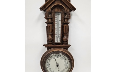 19th century oak cased elaborately carved banjo barometer ma...