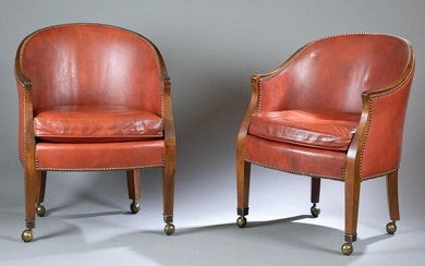 2 Leather barrel back chairs.