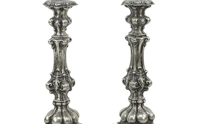 A Pair of Continental .750 Silver Candlesticks.