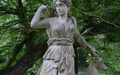 Diana the huntress with her dear. Stone sculpture …