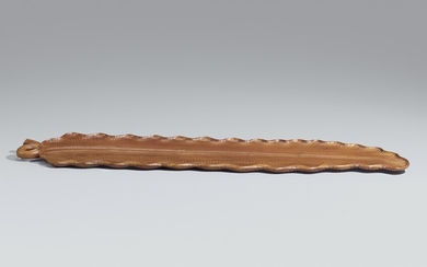 A long wood tray. 20th century