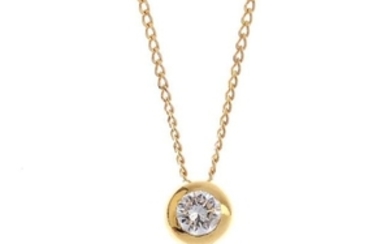 An 18ct gold diamond pendant. The brilliant-cut diamond