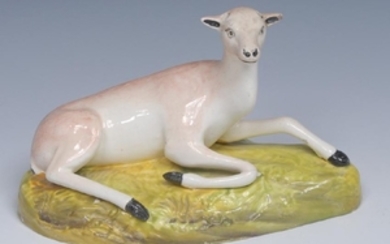 A Brameld model, of a deer, reclining, tan markings