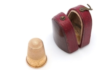 A cased mid-19th century French gold thimble, maker’s...