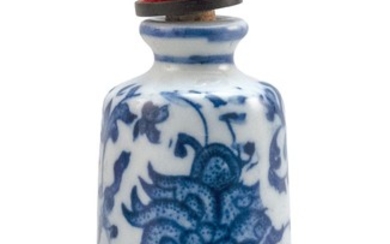 CHINESE BLUE AND WHITE PORCELAIN SNUFF BOTTLE In cylindrical form, with passionflower and vine design. Height 2". Coral stopper.