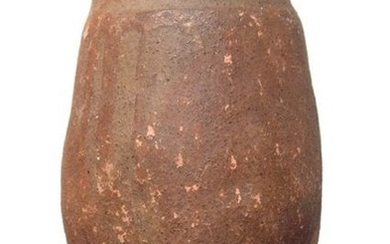 An Egyptian ceramic situla-type vessel