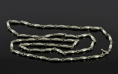 Georg Jensen, a Danish silver chain with ring and T-bar