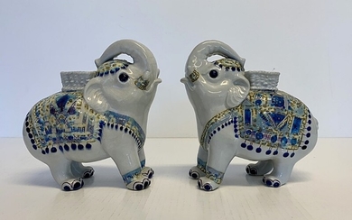 Jeanne Grut: A pair of “Tenera” candlesticks of faience in the form of elephants. Manufactured and stamped by Aluminia, 479/3193. H. 17.5 cm. L. 17 cm. (2)