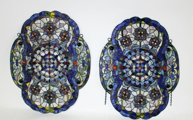 Pair of stained and jeweled glass panels