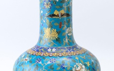 CHINESE CLOISONNÉ ENAMEL VASE In mallet form, with flower and butterfly design on a blue ground. Height 12.75".