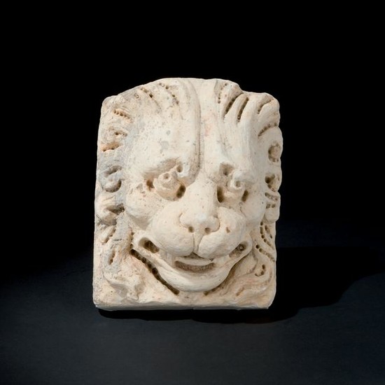A 17th century marble high relief of a lion's head