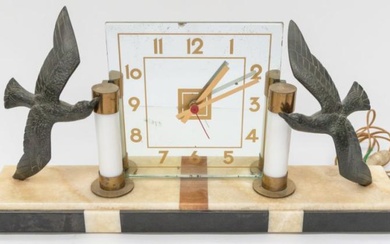 A 1930's Art Deco mantle clock with square mirrored face,...