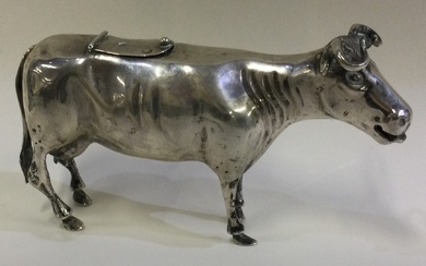 A 19th Century Continental silver creamer in the form of a cow.