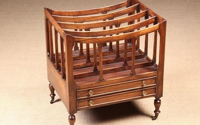 A 19th Century Mahogany Canterbury. The slatted divided with dipped tops above a partitioned tray to