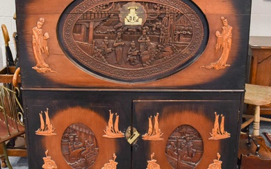 A 20th Century Chinese Carved Camphorwood Chest, fitted with a...