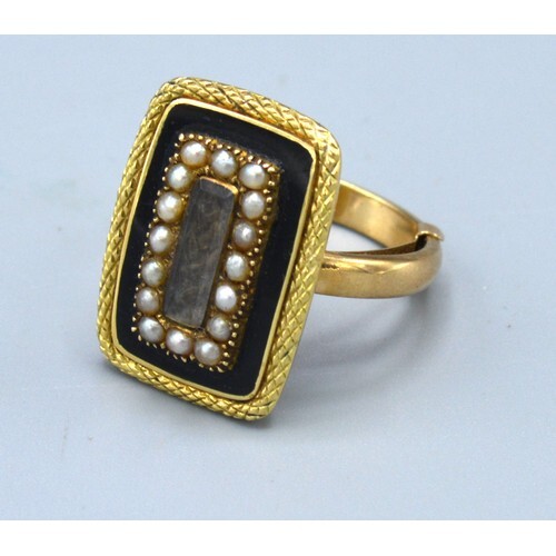 A 9ct. Gold Mourning Ring set seed pearls and enamel, ring s...