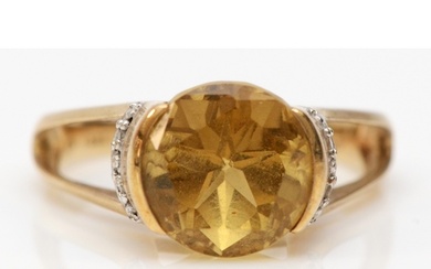 A 9ct gold citrine and diamond dress ring, O, 4.1gm