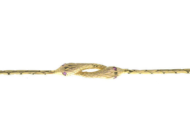 A 9ct gold snake bracelet, with ruby eyes.