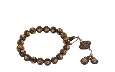 A CHINESE IMPERIAL ALOES-WOOD PRAYER BEADS