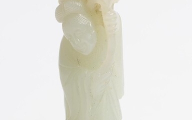 A CHINESE PALE CELADON JADE FIGURE OF A LADY QING DYNASTY (1644-1912), CIRCA 18TH CENTURY
