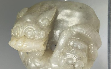 A CHINESE QING DYNASTY MYTHICAL ANIMAL JADE CARVING