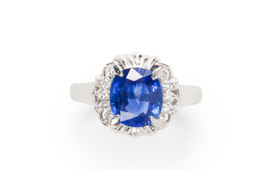 A Ceylon sapphire, diamond and platinum ring