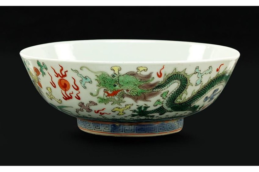A Chinese Wucai Glazed Porcelain Dragon Bowl.