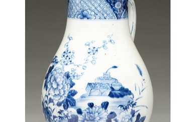 A Chinese blue and white jug, 18th c, painted with peony and...
