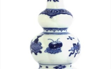 A Chinese blue and white triple gourd vase
