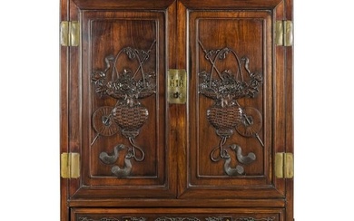 A Chinese carved hardwood cabinet, 19th century