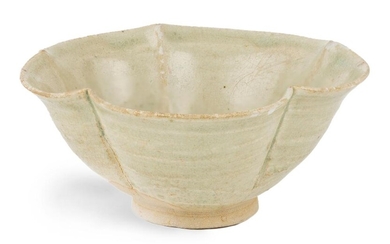 A Chinese celadon foliate bowl, Song dynasty, raised on short splayed foot, rising to deep sides with everted rim, covered in pale celadon glaze, 10.5cm diameter 宋 青白釉花口盌