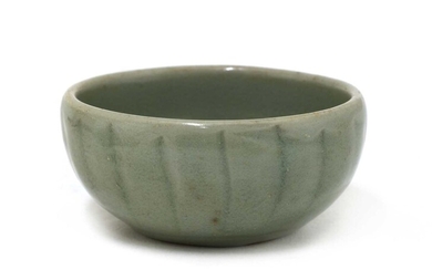 A Chinese celadon-glazed teacup