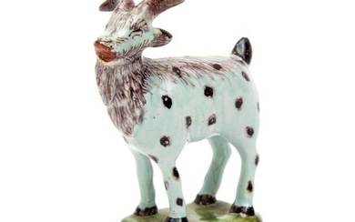 A Delft polychrome pottery figure of a billy goat
