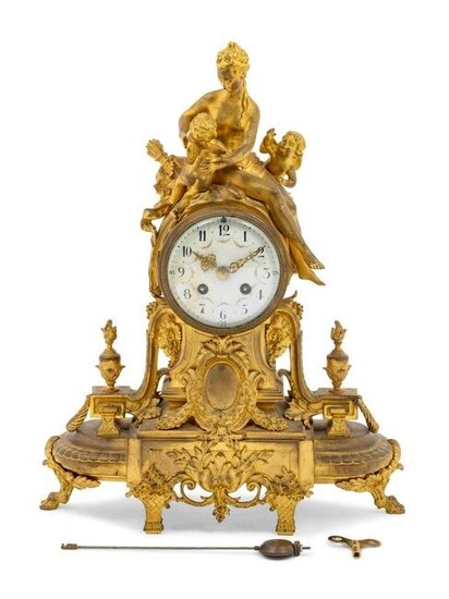 A French Gilt Bronze Figural Mantel Clock