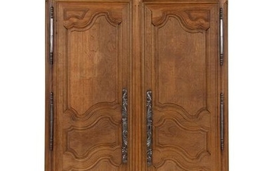 A French Provincial Carved Oak Armoire