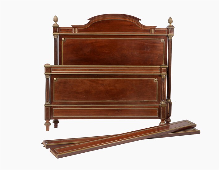 A French mahogany and brass inlaid bed in Directoire style