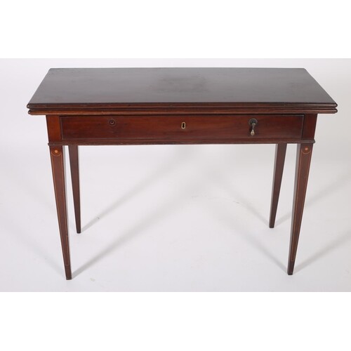 A GEORGIAN MAHOGANY FOLD OVER SUPPER TABLE the rectangular h...