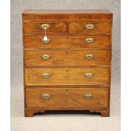 A GEORGIAN MAHOGANY STRAIGHT FRONTED TALL CHEST, c.1800, the...
