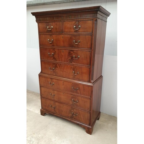 A GOOD GEORGIAN MAHOGANY CHEST ON CHEST, the top with moulde...