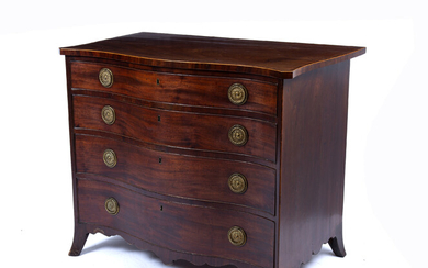 A George III serpentine fronted mahogany chest