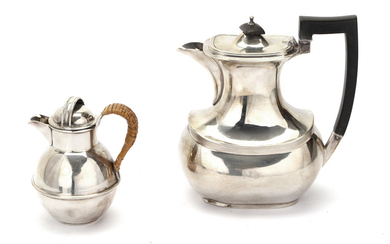 A George V sterling silver hot water pot, Birmingham 1928 by Barker Brothers Silver Ltd