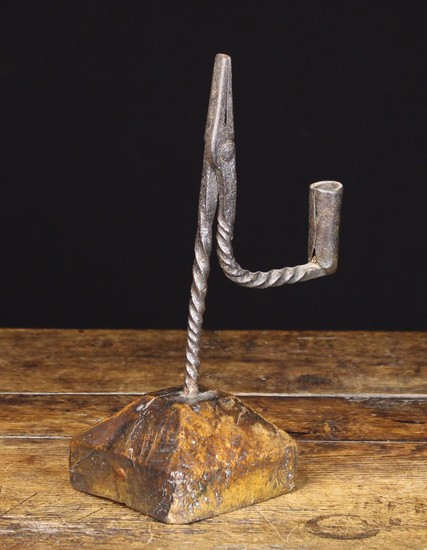 A Good 18th Century Wrought Iron Rush Nip with Candle-socket. The wrythen stem driven into a deep be