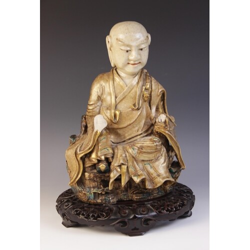 A Japanese satsuma porcelain model of Buddha, Meiji Period (...