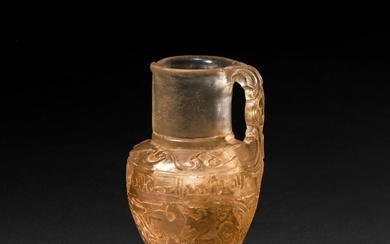 A KUFIC INSCRIBED ROCK CRYSTAL EWER IN THE STYLE OF FATIMID